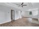 Spacious living room offers an open layout, new floors, and a tray ceiling at 2084 Bethel Nw Dr, Atlanta, GA 30314