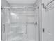Bright, glass-enclosed shower with white tile and modern fixtures at 2084 Bethel Nw Dr, Atlanta, GA 30314