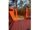 Backyard deck with a view of the fenced backyard and greenery at 3479 Thompson Nw Dr, Atlanta, GA 30331
