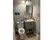 Well lit bathroom with modern vanity, toilet, and fixtures at 3479 Thompson Nw Dr, Atlanta, GA 30331