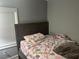 Modest bedroom with neutral walls and a large window at 3479 Thompson Nw Dr, Atlanta, GA 30331