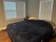 Relaxing bedroom with comfortable bedding, natural light, and modern decor at 3479 Thompson Nw Dr, Atlanta, GA 30331