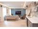 Basement features a living space, bar with beverage cooler, and modern finishes at 533 Beecham Dr, Smyrna, GA 30082