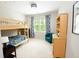 This bedroom offers a bunk bed, bookshelf, natural light and neutral decor at 533 Beecham Dr, Smyrna, GA 30082
