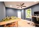 Well lit room with a large window, fan, and neutral paint offers a flexible space at 533 Beecham Dr, Smyrna, GA 30082