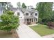 Charming two-story home with a welcoming front porch and a well-manicured lawn at 533 Beecham Dr, Smyrna, GA 30082