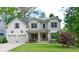 Beautiful two-story home with a well-manicured lawn, two-car garage and solar panels at 533 Beecham Dr, Smyrna, GA 30082