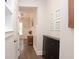 Inviting hallway featuring hardwood floors, wall decor, and an entryway bench with a seamless transition to other spaces at 533 Beecham Dr, Smyrna, GA 30082