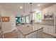 Bright, modern kitchen with granite countertops, stainless steel appliances, and a view to the breakfast area at 533 Beecham Dr, Smyrna, GA 30082