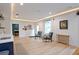 Open-concept living area features recessed lighting, hardwood floors, bar area, and picture window at 533 Beecham Dr, Smyrna, GA 30082