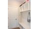 Functional mudroom with built-in shelving and storage, providing a tidy transition from the outdoors at 533 Beecham Dr, Smyrna, GA 30082