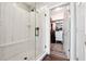Walk in shower with a glass door and access to a walk in closet at 825 Kennedy Ct, Loganville, GA 30052