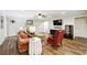 Open concept living room featuring hardwood floors and neutral paint at 825 Kennedy Ct, Loganville, GA 30052