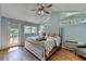 Comfortable bedroom with vaulted ceilings, lots of natural light and balcony access at 1450 Holly Bank Cir, Atlanta, GA 30338