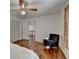 Bedroom with hardwood floors and a closet, offering a cozy space at 1450 Holly Bank Cir, Atlanta, GA 30338