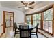 Charming breakfast nook features a bay window that offers views to the rear yard at 1450 Holly Bank Cir, Atlanta, GA 30338