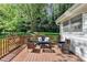 Deck with outdoor seating, surrounded by trees at 1450 Holly Bank Cir, Atlanta, GA 30338
