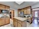 Bright kitchen features granite countertops, stainless steel appliances, and a center island at 1450 Holly Bank Cir, Atlanta, GA 30338