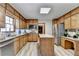 Bright kitchen features granite countertops, stainless steel appliances, and an island at 1450 Holly Bank Cir, Atlanta, GA 30338