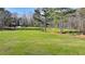 Scenic view of green park featuring expansive open spaces, trees, and recreation activities at 1450 Holly Bank Cir, Atlanta, GA 30338