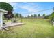 Spacious backyard featuring a patio with seating, a grassy area, and privacy fencing at 1625 Summit View Way, Snellville, GA 30078