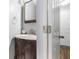 Charming bathroom featuring a vanity with a curved countertop and decorative accents at 1625 Summit View Way, Snellville, GA 30078