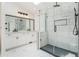 Modern bathroom featuring a glass-enclosed shower, double vanity, and stylish fixtures at 1625 Summit View Way, Snellville, GA 30078