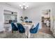Bright dining room featuring elegant decor, stylish furnishings, and seamless flow to the living spaces at 1625 Summit View Way, Snellville, GA 30078