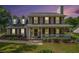 Charming two-story home featuring a welcoming front porch, beautiful landscaping, and classic design at 1625 Summit View Way, Snellville, GA 30078