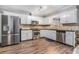 Modern kitchen featuring stainless steel appliances, updated countertops, and ample cabinet space at 1625 Summit View Way, Snellville, GA 30078