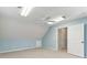 Bright bedroom features light blue walls, white trim, ceiling fan, and carpet flooring at 1981 Luke Edwards Rd, Dacula, GA 30019