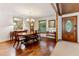 Bright dining room featuring wood floors, natural light and traditional furnishings at 1981 Luke Edwards Rd, Dacula, GA 30019