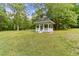 Open yard featuring gazebo, perfect for outdoor gatherings and recreation and enjoying the natural surroundings at 1981 Luke Edwards Rd, Dacula, GA 30019