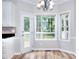 Cozy kitchen nook with bright windows, a door to the outside, and stylish flooring at 931 Bonaventure Way, Lawrenceville, GA 30044