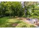 Wide shot of a backyard, featuring a basketball hoop at 120 Turman Se Ave, Atlanta, GA 30315