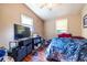 Standard bedroom with a hardwood floor, good natural light, and fair closet space at 120 Turman Se Ave, Atlanta, GA 30315