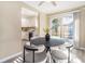 Cozy dining area featuring a sliding glass door leading to a patio, modern furnishings, and natural light at 136 Peachtree Memorial Nw Dr # Va2, Atlanta, GA 30309