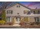 Charming condo showcasing a stone facade, updated siding, and a well-maintained landscape at 136 Peachtree Memorial Nw Dr # Va2, Atlanta, GA 30309