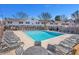 Community pool offering lounge chairs and tables for relaxing and socializing by the water at 136 Peachtree Memorial Nw Dr # Va2, Atlanta, GA 30309