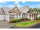 Charming home exterior with stone accents, manicured lawn, and a welcoming entrance at 226 Hames Rd # 335, Woodstock, GA 30188