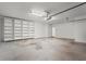 Spacious garage with built-in shelving, concrete flooring, and ample room for storage or parking at 226 Hames Rd # 335, Woodstock, GA 30188