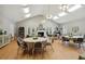 Large community meeting room featuring hardwood floors, ample seating and tables at 226 Hames Rd # 335, Woodstock, GA 30188