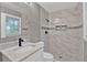 Modern bathroom with a walk-in shower and sleek vanity at 2417 Jade Dr, Lawrenceville, GA 30044