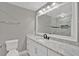 Modern bathroom with updated vanity, marble countertops, and a tiled shower at 2417 Jade Dr, Lawrenceville, GA 30044