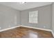 Bedroom with hardwood floors and natural light at 2417 Jade Dr, Lawrenceville, GA 30044