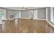 Spacious living area featuring stylish lighting, fireplace and hardwood floors at 2417 Jade Dr, Lawrenceville, GA 30044