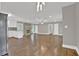 Spacious living area featuring stylish lighting, fireplace and hardwood floors at 2417 Jade Dr, Lawrenceville, GA 30044