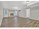 Spacious living room with updated flooring, fireplace, and plenty of natural light at 2417 Jade Dr, Lawrenceville, GA 30044