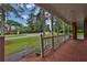Covered porch with brick flooring overlooking the street at 2417 Jade Dr, Lawrenceville, GA 30044