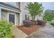 View of the front entrance, showcasing a well-maintained walkway and garden at 3733 Sidney Lanier Blvd, Duluth, GA 30096